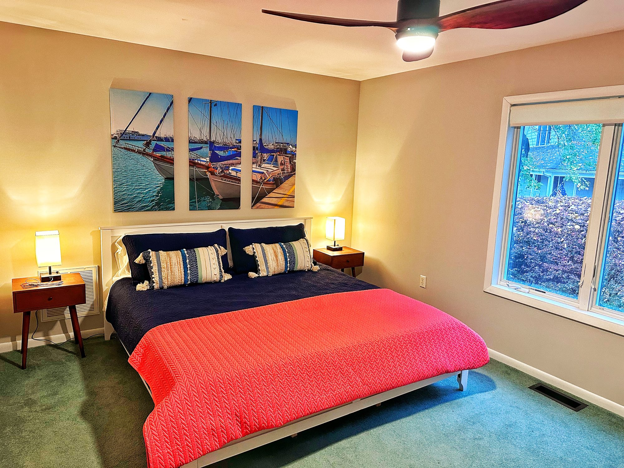 Bedroom 2 king bed with navy and coral bedding