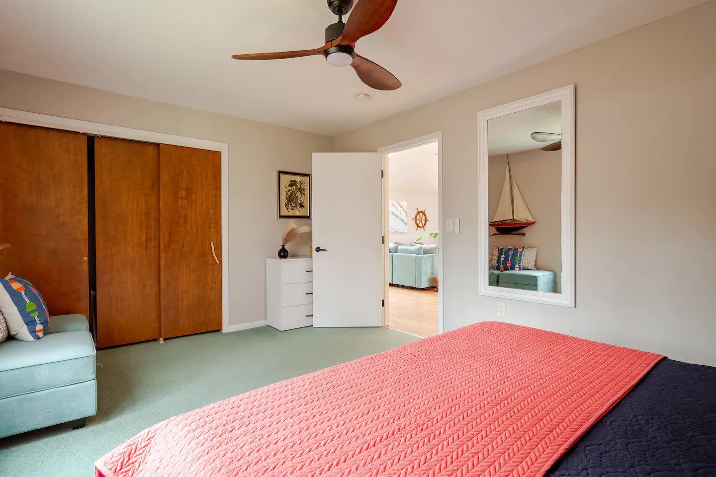 Bedroom 2 closet and coral bedding