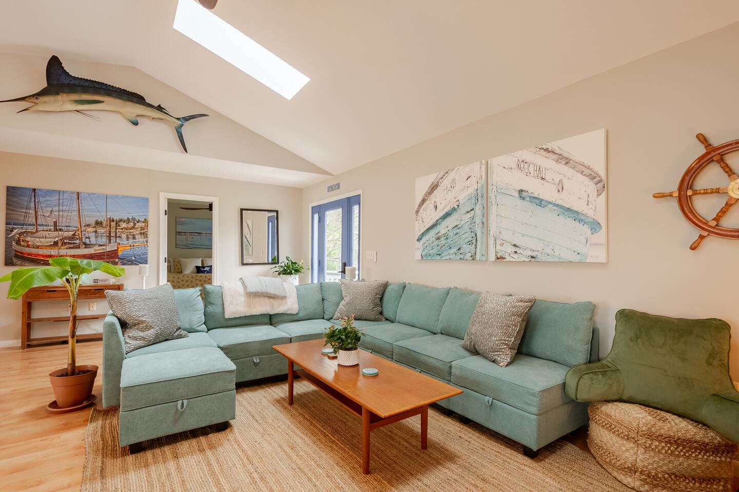 Living room with boat artwork