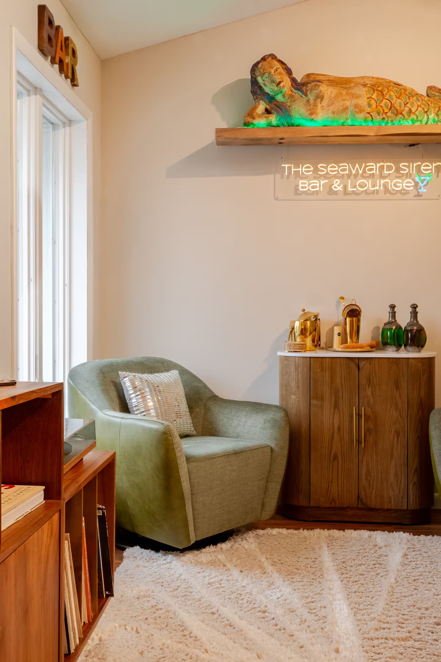 Bar cabinet and neon sign