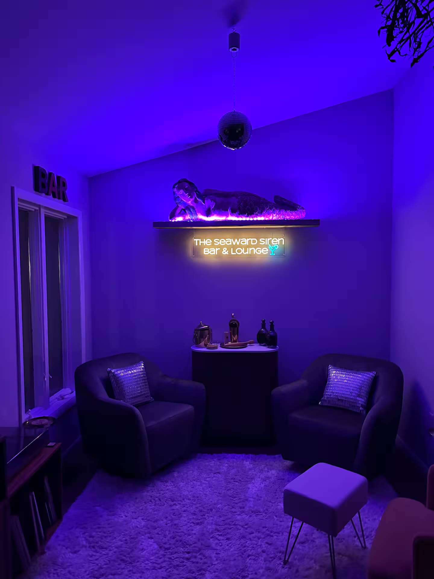 Lounge at night with neon lighting